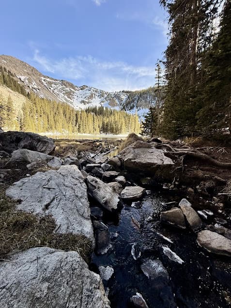 Stream flowing out of Nambe Lake in New Mexico. 