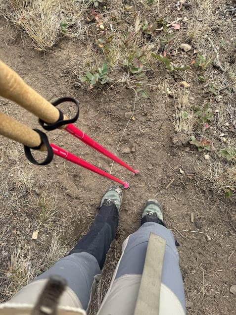 Hiker using poles to train for an ultramarathon