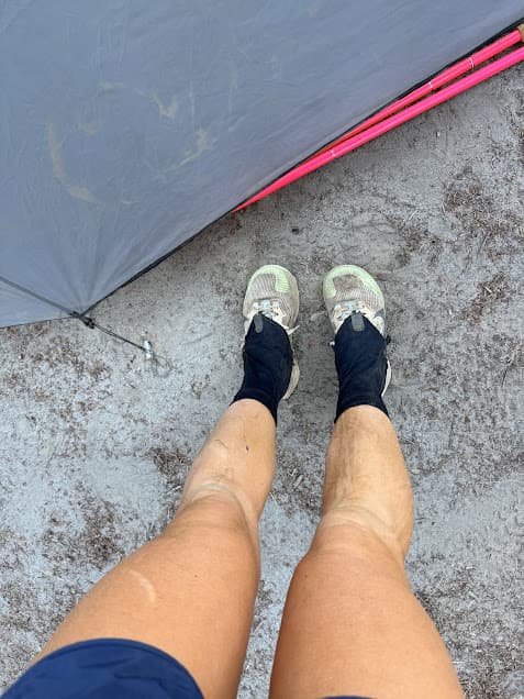 Gaiters and hiking poles for ultramarathon.